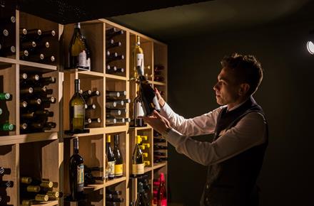 A sommelier at work