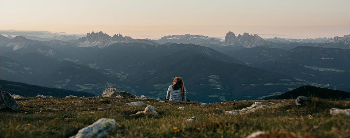 A woman enjoys the mountain view